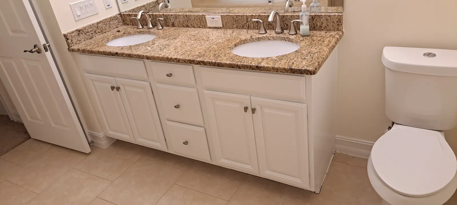 Bathroom double vanity cabinets painted white in Avon, IN
