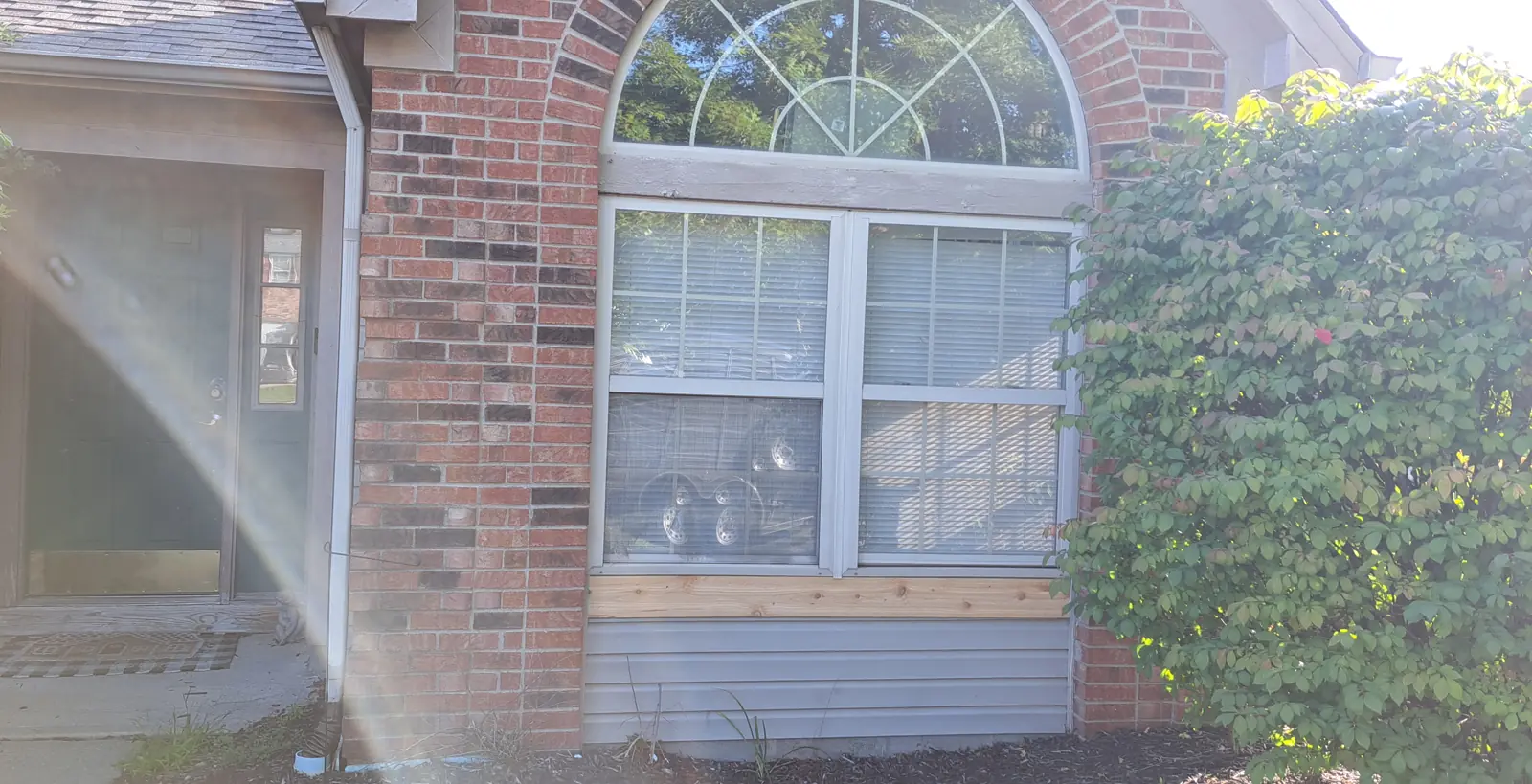 Brick and trim cleaned before painting in Avon, IN