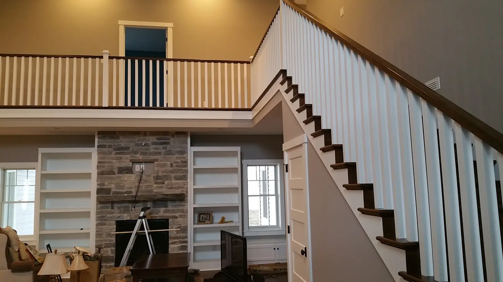 Built-in shelving and trim painted white in Avon, IN