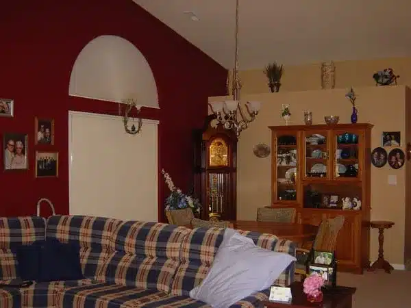 Living room painted a warm deep red in Brownsburg, IN